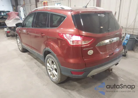 2014 Ford Escape Titanium z USA, uszkodzony, nr VIN 1FMCU9J97EUE55734